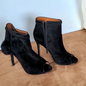 Cute black suede boots with pom poms and open toes!
